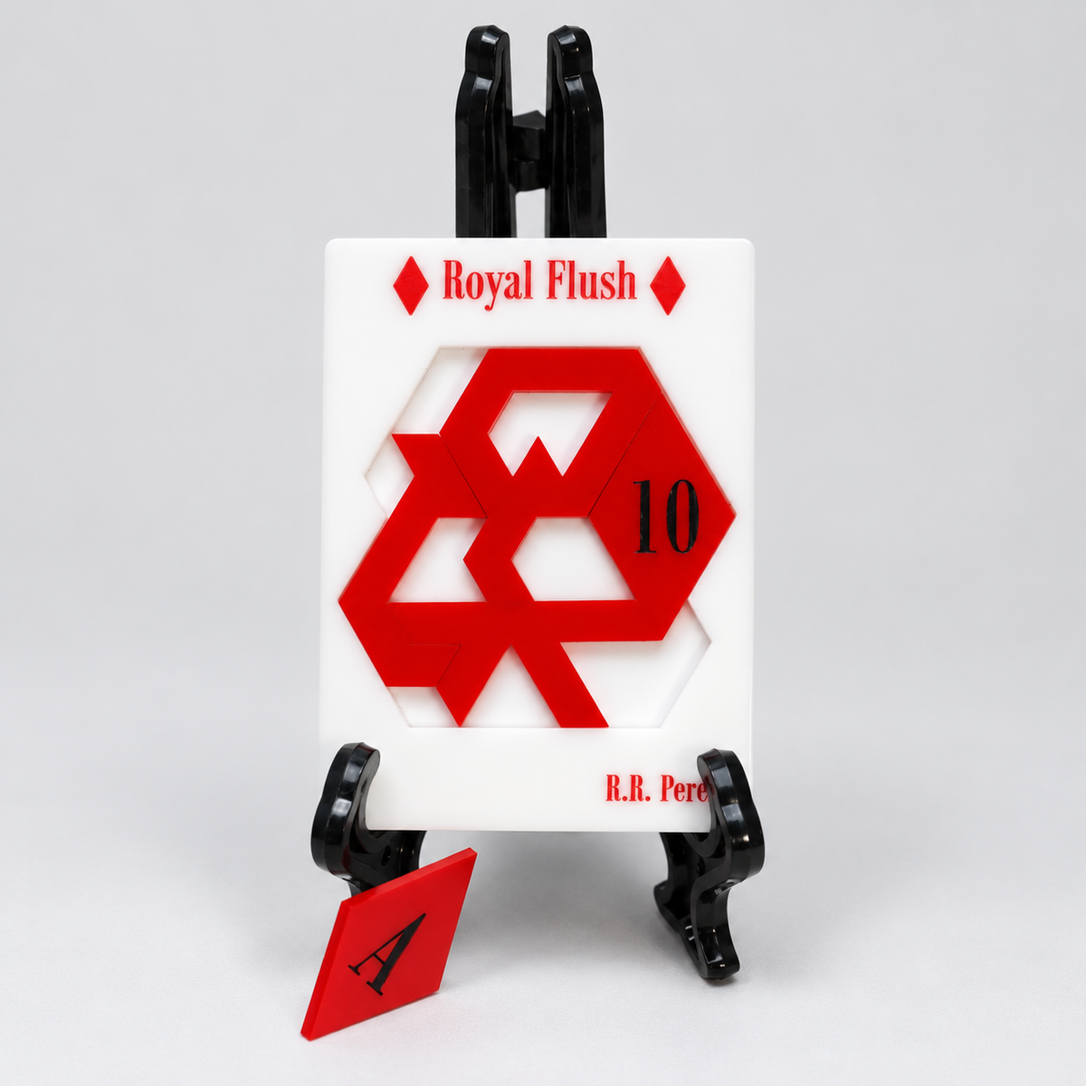 Royal Flush Diamonds red acrylic puzzle with loose diamond ace and black display stand