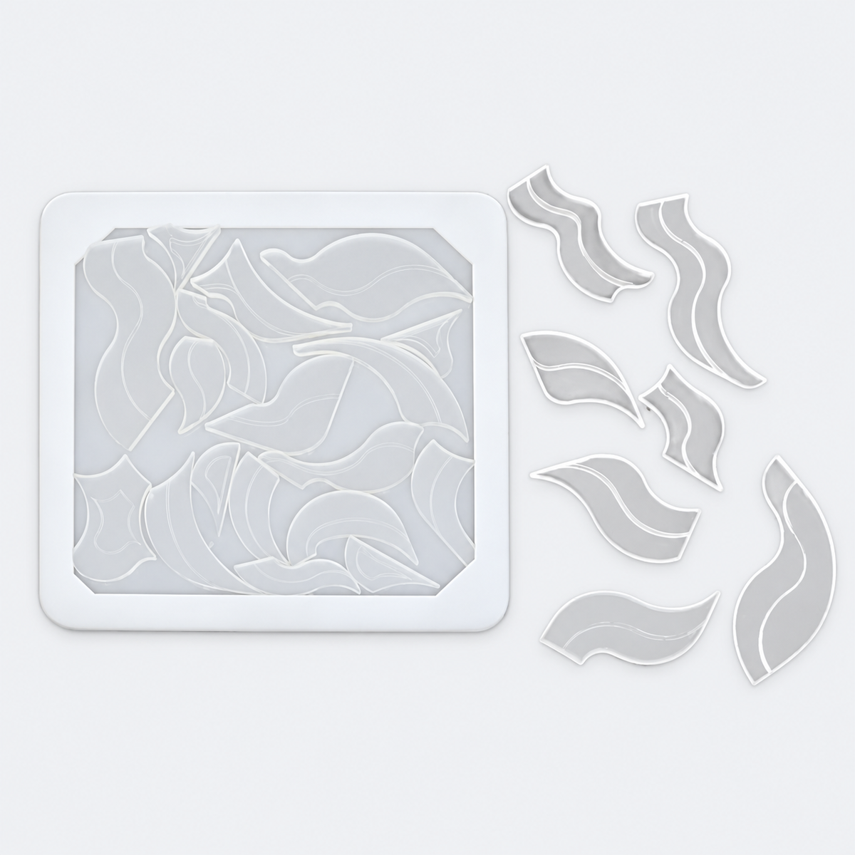 Uca acrylic packing puzzle by Acazu with tray and pieces