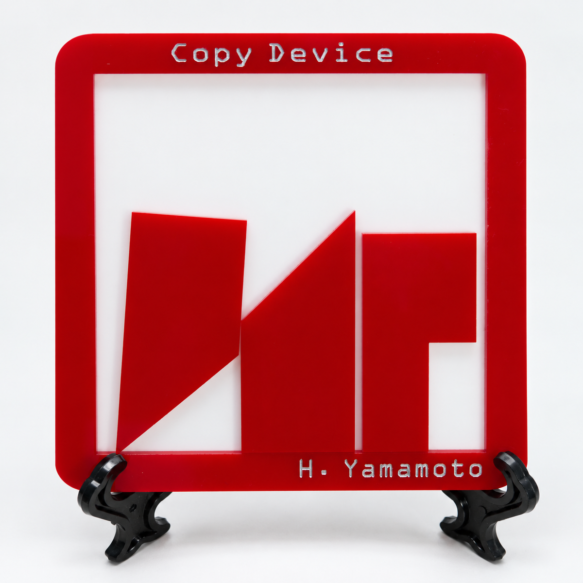 Copy Device acrylic puzzle, original three red pieces and stand
