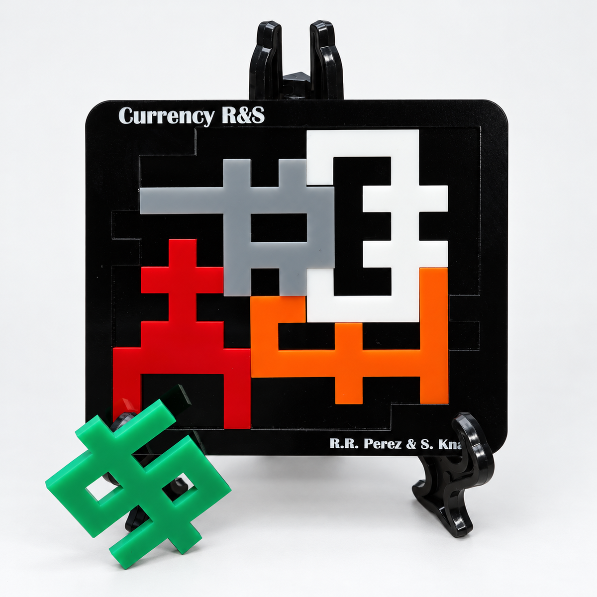 Currency R&S five-piece acrylic packing puzzle with loose green piece and black display stand