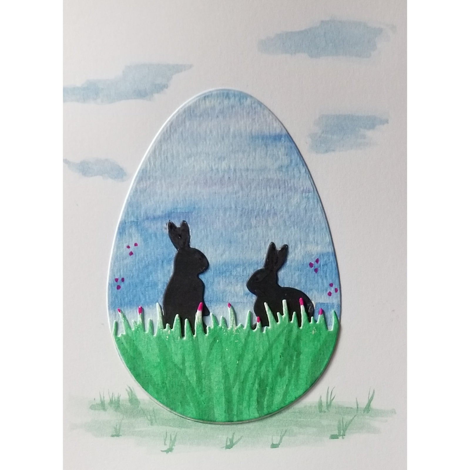 Create Your Own Spring Scene with Large Egg, Grass Background, and Bunnies